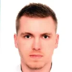 Ukrainian Alliance Чоловік у білій сорочці позує для фото на українському альянсі.